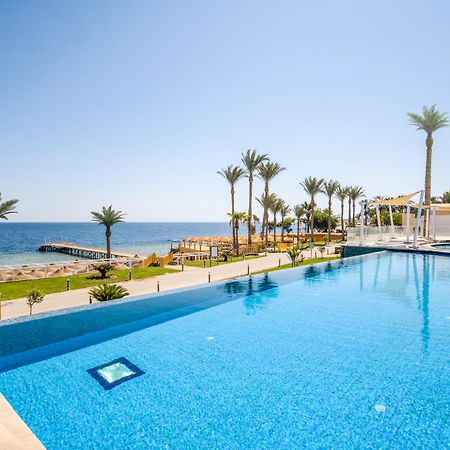 Sunrise Diamond Beach Resort -Grand Select Sharm el-Sheikh Exterior photo Pool at the Hilton Sharm El Sheikh
