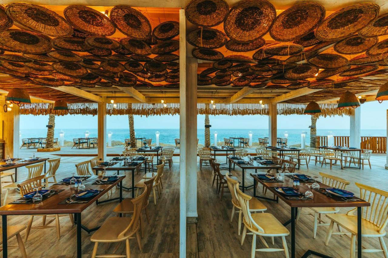Sunrise Diamond Beach Resort -Grand Select Sharm el-Sheikh Exterior photo The restaurant at the top of the lighthouse